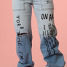 Wide Leg Stretch Jeans With Writing - The Fashion Unicorn